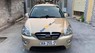 Kia Carens LX 1.6 MT 2011 - Cần bán xe Kia Carens LX 1.6 MT năm sản xuất 2011, màu vàng