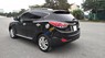 Hyundai Tucson 2.0 AT.  2011 - Bán Hyundai Tucson 2.0 AT. năm 2011, màu đen, nhập khẩu nguyên chiếc số tự động