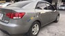 Kia Forte MT 2010 - Bán xe Kia Forte năm 2010 màu xám (ghi), giá tốt