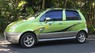 Daewoo Matiz SE 2007 - Cần bán Daewoo Matiz SE sản xuất 2007, màu xanh lục chính chủ, giá 145tr
