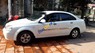 Daewoo Lacetti 2004 - Cần bán xe Daewoo Lacetti sản xuất năm 2004, màu trắng, xe đẹp 