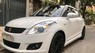 Suzuki Swift 1.4 AT 2014 - Chính chủ cần bán Suzuki Swift màu trắng, đời 2014, số tự động, máy xăng
