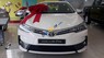 Toyota Corolla altis 1.8E MT 2019 - Bán Toyota Corolla altis 1.8E MT sản xuất năm 2019, màu trắng, 672 triệu