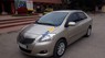 Toyota Vios   1.5 E 2011 - Cần bán xe cũ Toyota Vios 1.5 E năm 2011, màu vàng 