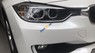 BMW 3 Series 320i  2012 - Cần bán lại xe BMW 3 Series 320i sản xuất 2012, màu trắng, xe nhập, 700 triệu