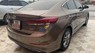 Hyundai Elantra 1.6 AT 2016 - Cần bán gấp Hyundai Elantra 1.6 AT sản xuất 2016, màu nâu