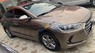 Hyundai Elantra 1.6 AT 2016 - Cần bán gấp Hyundai Elantra 1.6 AT sản xuất 2016, màu nâu