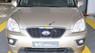 Kia Carens 2.0MT 2015 - Cần bán xe cũ Kia Carens 2.0MT sản xuất năm 2015, màu vàng 