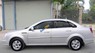 Daewoo Lacetti 1.6EX 2010 - Cần bán xe Daewoo Lacetti 1.6EX sản xuất 2010, màu bạc chính chủ, giá tốt