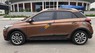 Hyundai i20 Active 1.4AT 2016 - Bán gấp Hyundai i20 Active 1.4AT năm 2016, màu nâu, xe nhập  