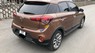 Hyundai i20 Active 1.4AT 2016 - Bán gấp Hyundai i20 Active 1.4AT năm 2016, màu nâu, xe nhập  