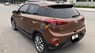 Hyundai i20 Active 1.4AT 2016 - Bán gấp Hyundai i20 Active 1.4AT năm 2016, màu nâu, xe nhập  