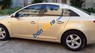 Chevrolet Cruze   2011 - Cần bán gấp Chevrolet Cruze năm sản xuất 2011, màu vàng số sàn