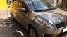 Suzuki Ertiga 2016 - Bán xe Suzuki Ertiga năm sản xuất 2016, màu vàng  