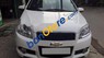 Chevrolet Aveo 2014 - Cần bán gấp Chevrolet Aveo sản xuất 2014, màu trắng xe gia đình 