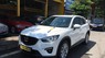 Mazda CX 5 2.0AT 2015 - Cần bán xe Mazda CX 5 2.0 sản xuất 2015, màu trắng chính chủ, giá tốt