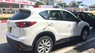 Mazda CX 5 2.0AT 2015 - Cần bán xe Mazda CX 5 2.0 sản xuất 2015, màu trắng chính chủ, giá tốt