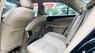 Toyota Camry 2.0E 2014 - Bán Toyota Camry 2.0E sản xuất năm 2014, màu đen