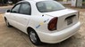 Daewoo Lanos   2000 - Cần bán Daewoo Lanos sản xuất năm 2000, màu trắng