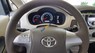 Toyota Innova G 2013 - Cần bán xe Toyota Innova G sản xuất năm 2013, màu vàng số tự động, giá 570tr