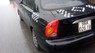 Daewoo Lanos Sx 2002 - Cần bán xe Daewoo Lanos Sx sản xuất năm 2002, màu đen