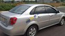 Daewoo Lacetti MT 2009 - Bán xe cũ Daewoo Lacetti MT sản xuất năm 2009, màu bạc