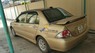Mitsubishi Lancer 2004 - Bán ô tô Mitsubishi Lancer sản xuất năm 2004, màu vàng xe gia đình