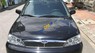 Ford Laser   2002 - Bán Ford Laser năm sản xuất 2002, màu đen, nhập khẩu, giá tốt