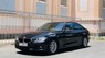 BMW 3 Series 2014 - Cần bán BMW 3 Series 320i sản xuất năm 2014, màu đen, nhập khẩu nguyên chiếc, giá 880tr