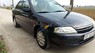 Ford Laser 1999 - Cần bán xe Ford Laser năm sản xuất 1999, màu đen xe gia đình, giá 93tr