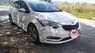 Kia Cerato 2014 - Cần bán lại xe Kia Cerato năm 2014, màu trắng, nhập khẩu nguyên chiếc còn mới, giá tốt