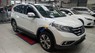 Honda CR V   2.4AT  2014 - Cần bán lại xe Honda CR V 2.4AT sản xuất 2014, màu trắng xe gia đình
