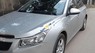 Chevrolet Cruze   2011 - Bán Chevrolet Cruze sản xuất 2011, màu bạc số tự động, giá chỉ 302 triệu