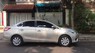 Toyota Vios 1.5E 2016 - Tôi cần bán chiếc xe ô tô Toyota Vios 1.5E màu ghi vàng, 2016