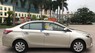 Toyota Vios 2014 - Cần bán lại xe Toyota Vios sản xuất 2014, màu vàng