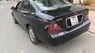 Daewoo Magnus 2004 - Bán xe cũ Daewoo Magnus sản xuất 2004, màu đen