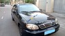 Daewoo Lanos   2004 - Bán ô tô Daewoo Lanos sản xuất năm 2004, màu đen chính chủ, giá tốt