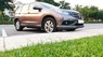 Honda CR V 2.0AT 2013 - Nhà cần bán Honda CR V 2.0AT 2013, màu xám hồng