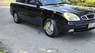 Daewoo Nubira 2003 - Cần bán lại xe Daewoo Nubira năm 2003, màu đen xe gia đình, giá 65tr