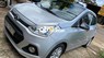 Hyundai Grand i10 2015 - Cần bán Hyundai Grand i10 sản xuất năm 2015, màu bạc chính chủ