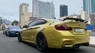 BMW M4   2017 - Bán ô tô BMW M4 đời 2017, màu vàng, xe nhập còn mới