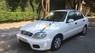 Daewoo Lanos 2004 - Cần bán xe Daewoo Lanos đời 2004, màu trắng