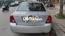 Ford Laser 2004 - Cần bán lại xe Ford Laser 1.6MT đời 2004, màu bạc, giá 130tr