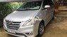 Toyota Innova 2.0E MT 2014 - Cần bán lại xe Toyota Innova 2.0E MT sản xuất năm 2014, màu bạc