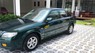 Mazda 323 2003 - Màu xanh lục, giá chỉ 155 triệu