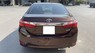 Toyota Corolla altis 1.8G 2017 - Cần bán lại xe Toyota Corolla altis 1.8G 2017, màu nâu, 595 triệu