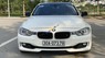 BMW 320i 2013 - Cần bán lại xe màu trắng