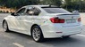 BMW 320i 2013 - Cần bán lại xe màu trắng