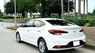 Hyundai Elantra 1.6 AT 2021 - Cần bán xe Hyundai Elantra 1.6 AT đời 2021, màu trắng, xe chạy ít đi gia đình
