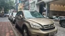 Honda CR V 2010 - Bán xe Honda Chọn 2010, màu vàng